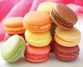 Commonly mistaken for tiny Play-Doh cheeseburgers, macaroons are an edible dessert typically made without the former's borax and petroleum additives. Confirm with your baker before sampling. 